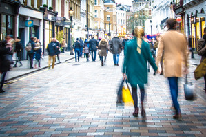 Shoppers walking down the high street